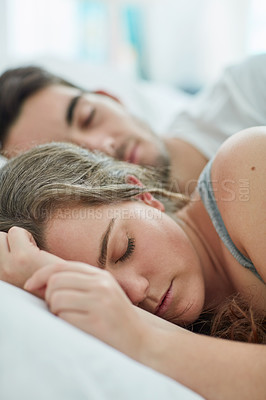 Buy stock photo Sleeping, peace and couple in a bed with love, safety and security, comfort and bonding in their home. Relax, sleep and people in a bedroom with nap, snooze or lazy morning, dream or rest in a house