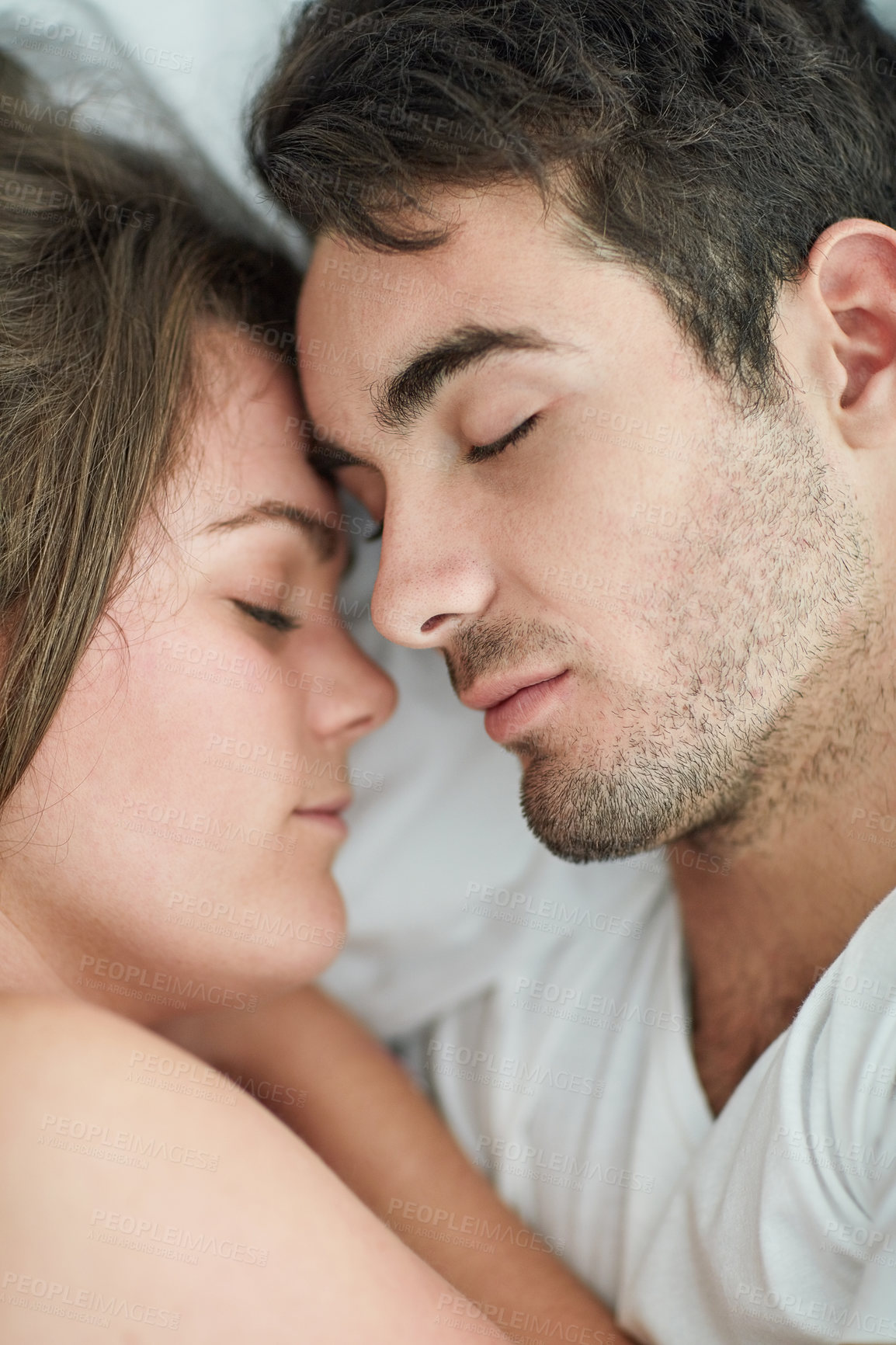 Buy stock photo Couple, together and sleeping in bed, weekend and love in house, morning and relax for romance and comfort. Apartment, woman and man in marriage, bonding and nap for break with peace, tired and home