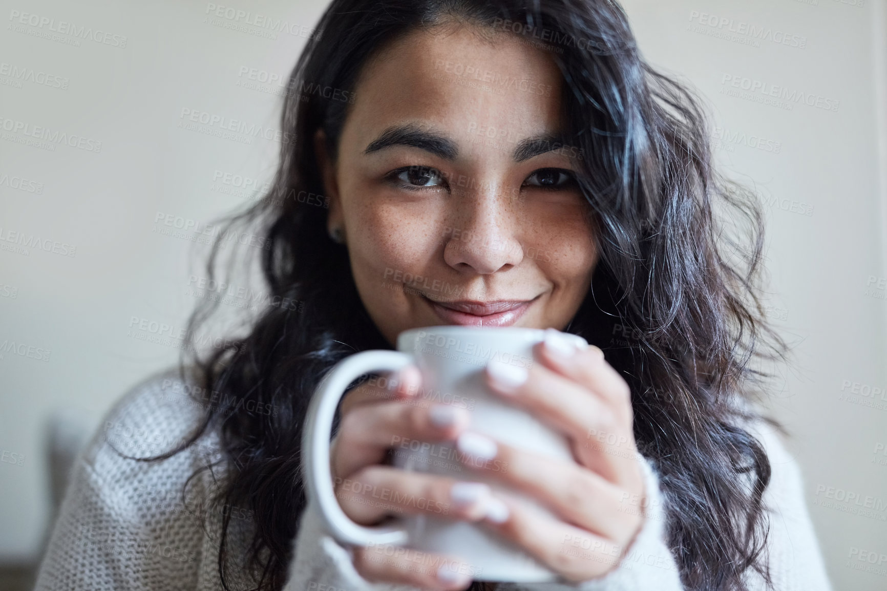 Buy stock photo Portrait, cup and coffee for woman, hands and relax in home for comfort. Smile, peace and happy in house living room with tea and drinking, self care and beverage for female person in Switzerland