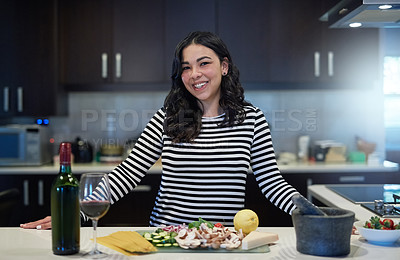 Buy stock photo Portrait of an attractive young woman preparing a nutritious meal at home