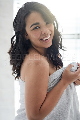 Buy stock photo Portrait of an attractive young woman wrapped in a towel after her shower