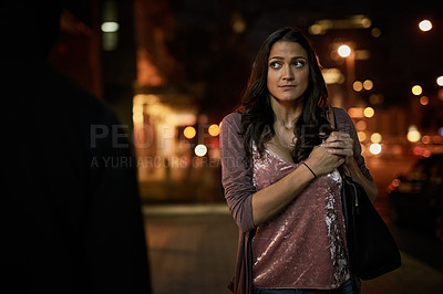 Buy stock photo Cropped shot of a frightened young woman being targeted by a thief