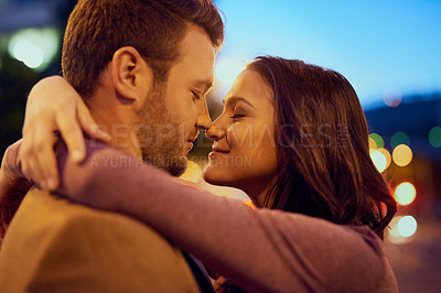 Buy stock photo Couple, night and hug outdoor with love, nose touch and bonding for romance and sweet moment. Happy, affection and people with commitment and trust, security and support together with time together