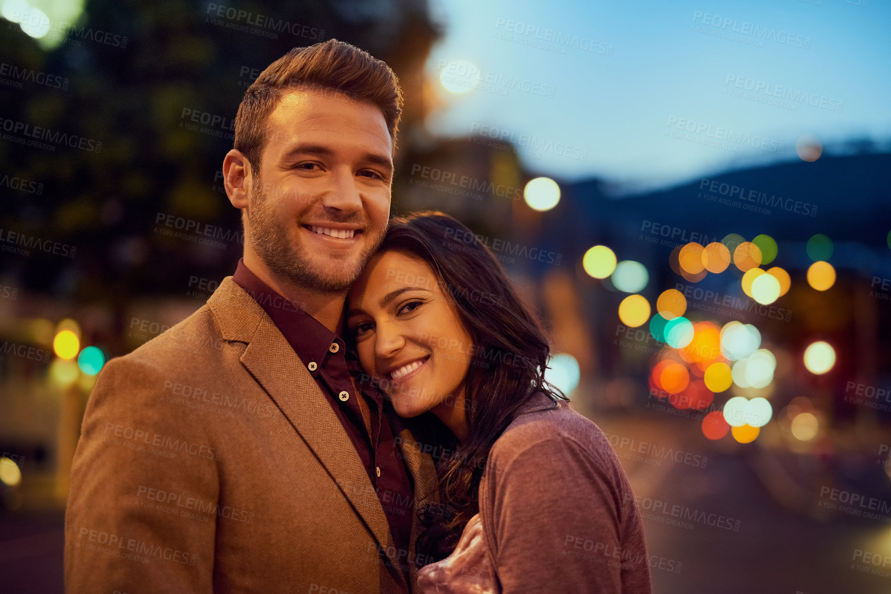 Buy stock photo Portrait, man and woman on date, night and hug or embrace for anniversary together. Outdoor, road and couple, care and female person in relationship with partner, love and romance in New York city