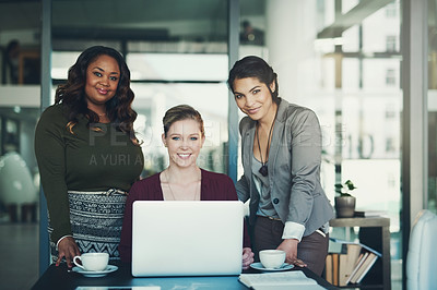 Buy stock photo Cropped portrait of three businesswoman gathered around a laptop in the office