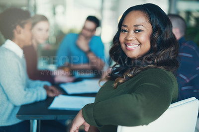 Buy stock photo Portrait of a young businesswoman sitting in the boardroom during a meeting