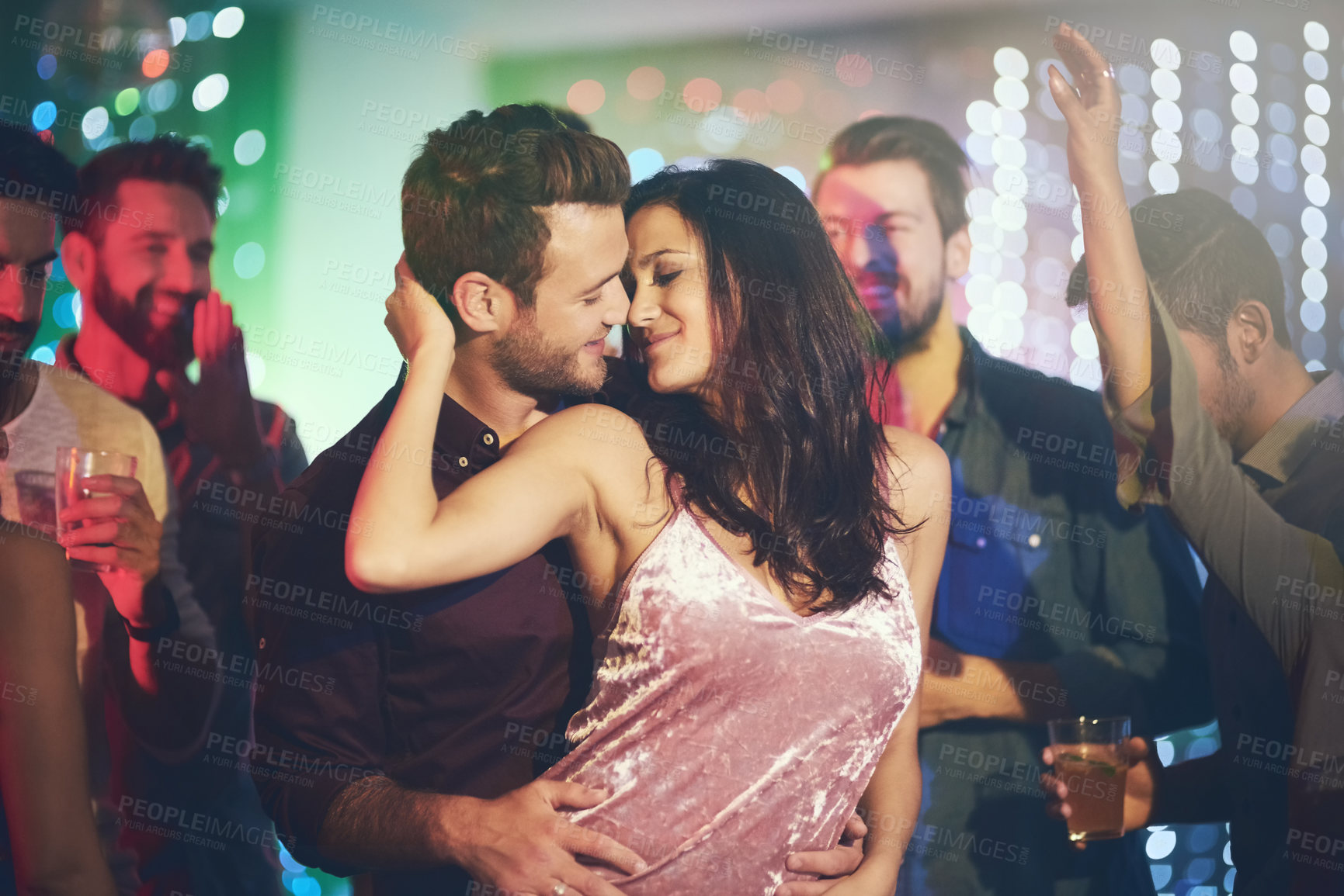 Buy stock photo Couple, dance and love in club at night on date with romance in marriage or relationship. People, celebrate and embrace together with happiness at disco, party or rave at techno at music festival