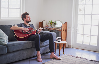 Buy stock photo Home, talent and man with guitar, play and skills for music, art and ready for performance in show. House, equipment and artist with instrument, hands and creative with fingers, solo and band