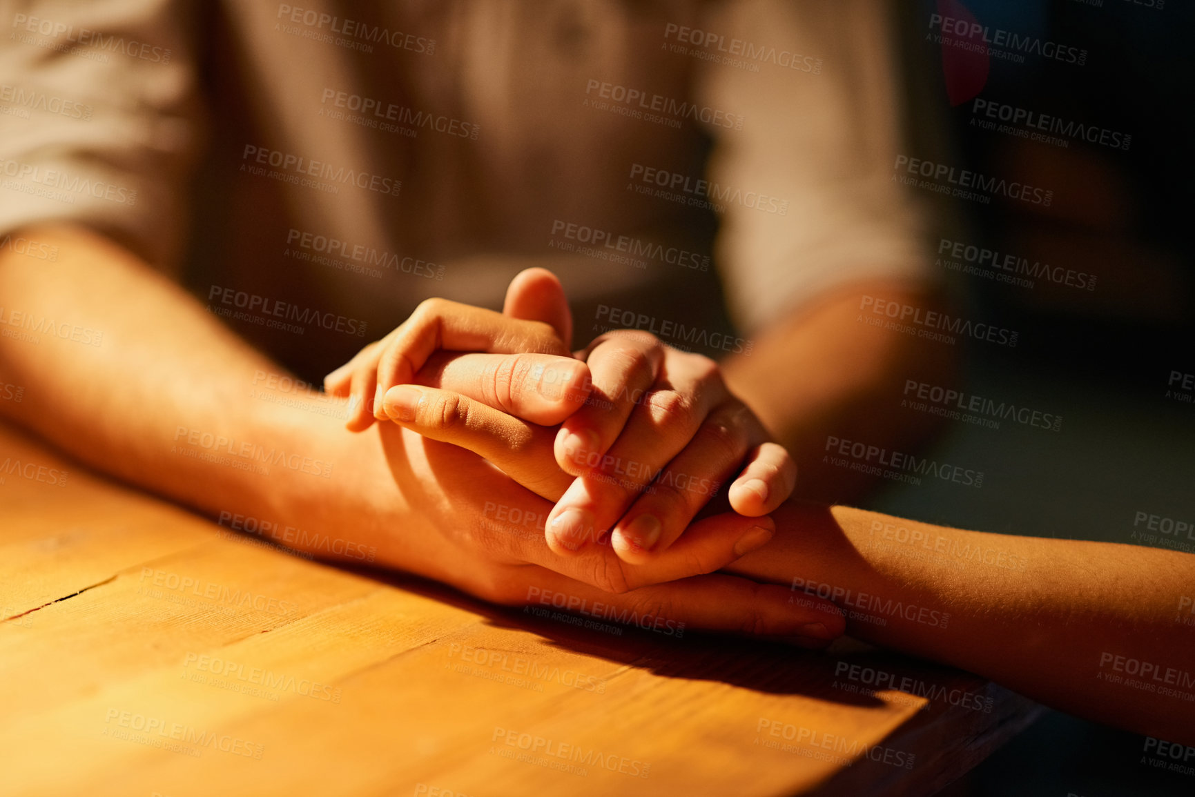 Buy stock photo Cropped shot of a couple holding hands