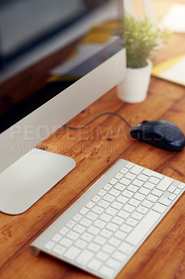 Buy stock photo Shot of a computer and keyboard on a desk