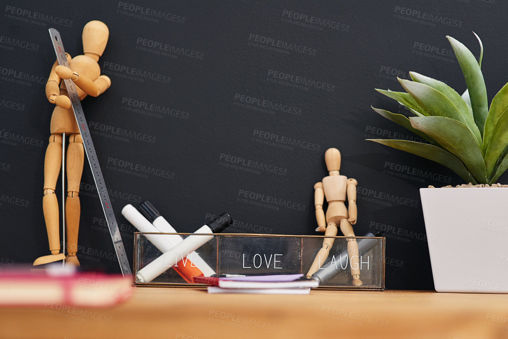 Buy stock photo Shot of various accessories on a work desk