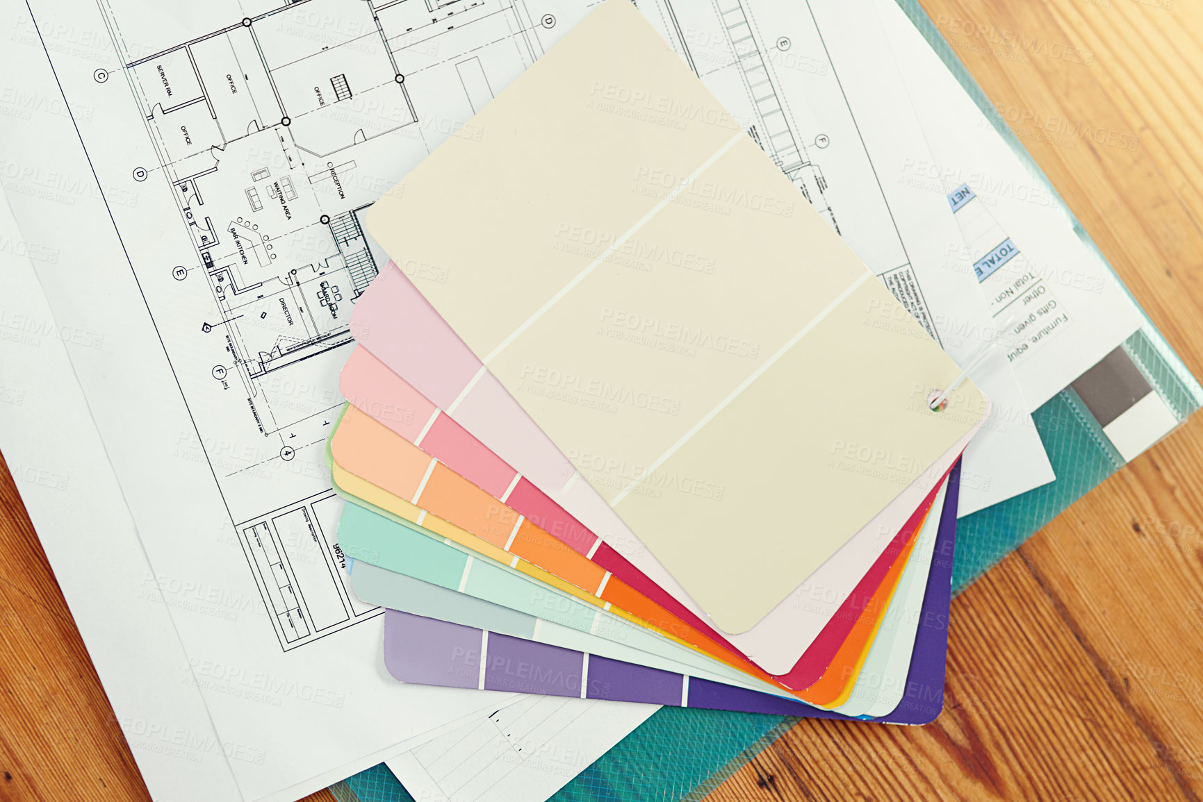 Buy stock photo High angle shot of color swatches and paperwork on a desk