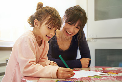 Buy stock photo Happy mother, daughter and drawing with paper for coloring activity, bonding or homework. Mom and little girl, child or young kid with smile for imagination, creativity or childhood together at house