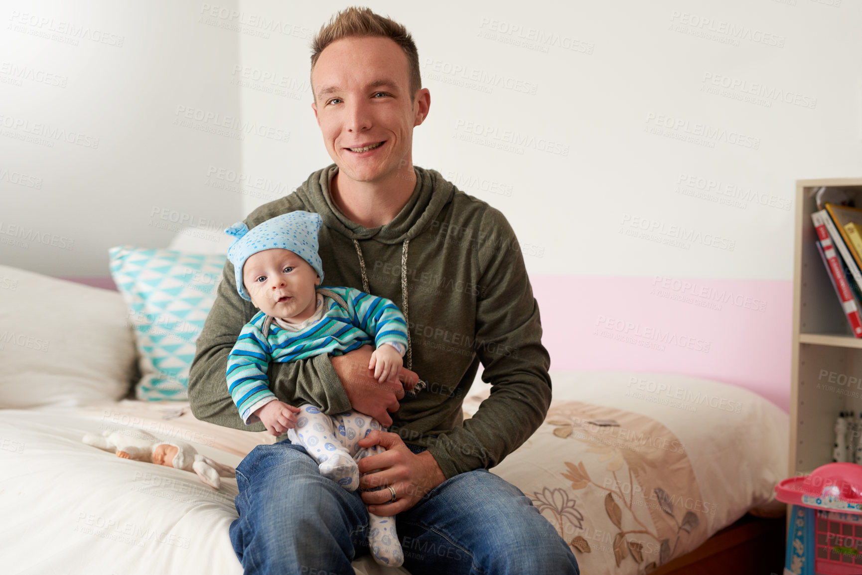 Buy stock photo Portrait of a father bonding with his baby boy at home