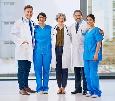Buy stock photo Portrait of a medical team standing in a hospital