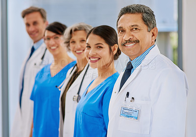Buy stock photo Portrait of a medical team standing in a hospital