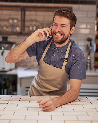 Buy stock photo Man, coffee shop or cafe phone call with smile for contact, deal and beverage order at small business. Happy, barista or waiter mobile in kitchen for conversation, networking and customer service