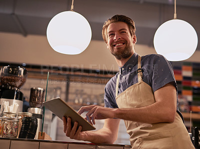 Buy stock photo Man, smile and cafe with tablet for contact, online deal or beverage order at small business. Restaurant, barista or waiter in kitchen with tech for communication, networking or customer service