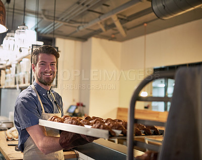 Buy stock photo Man, bakery and portrait with croissant in restaurant for breakfast, brunch and morning in hospitality. Male person, chef and pastry in kitchen for cooking, presentation and career in coffee shop