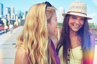 Buy stock photo Shot of best friends having a good time out in the city