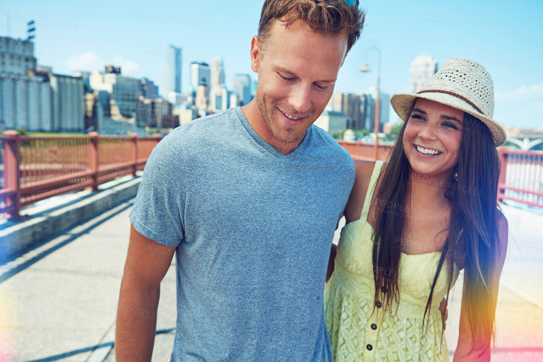 Buy stock photo Cropped shot of a young couple out on a date in the city