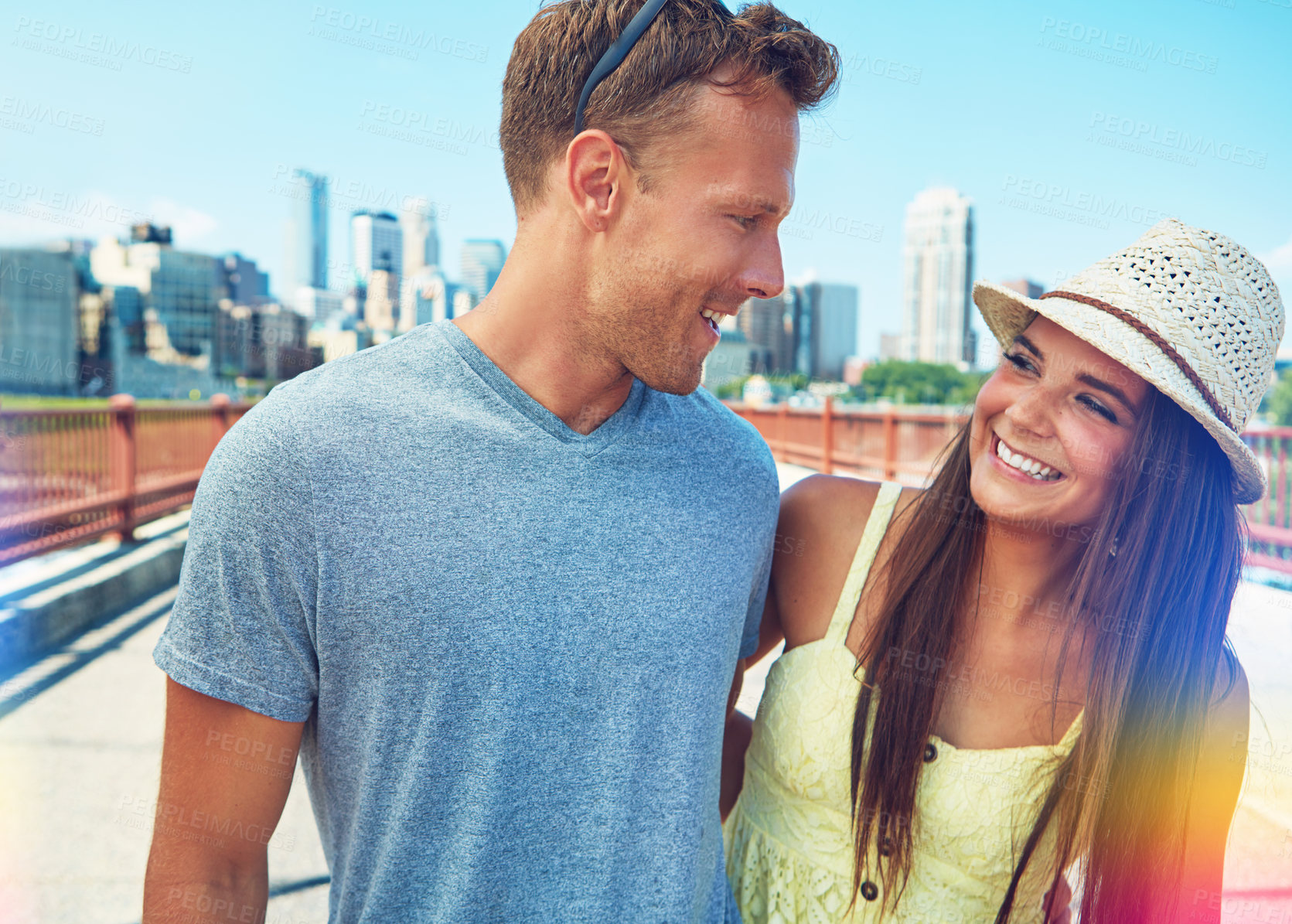 Buy stock photo Cropped shot of a young couple out on a date in the city