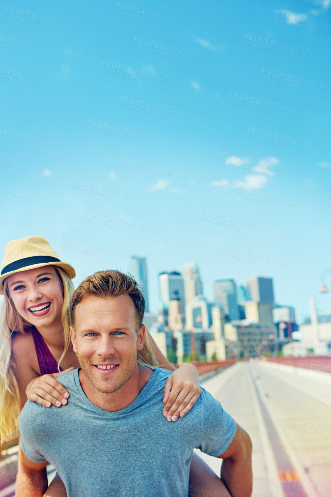 Buy stock photo Cropped shot of a young couple out on a date in the city