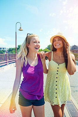 Buy stock photo Shot of best friends having a good time out in the city