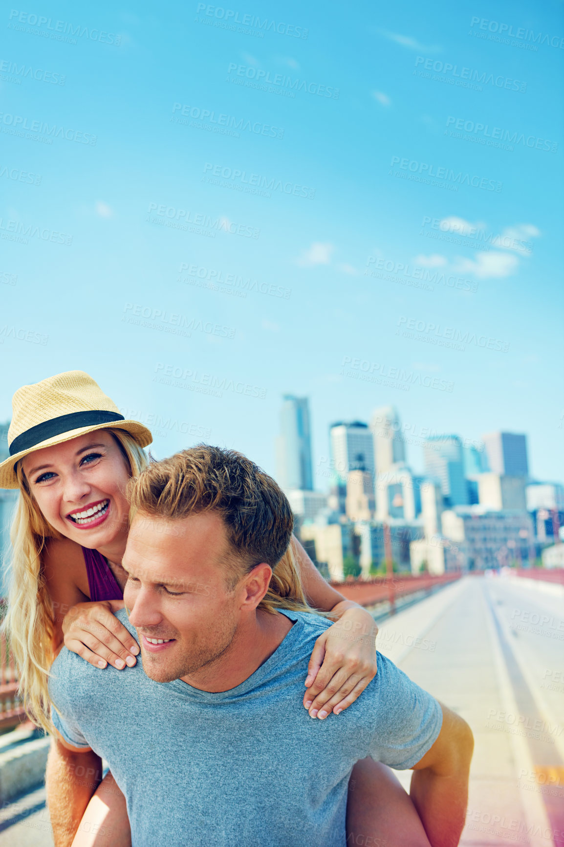 Buy stock photo Cropped shot of a young couple out on a date in the city