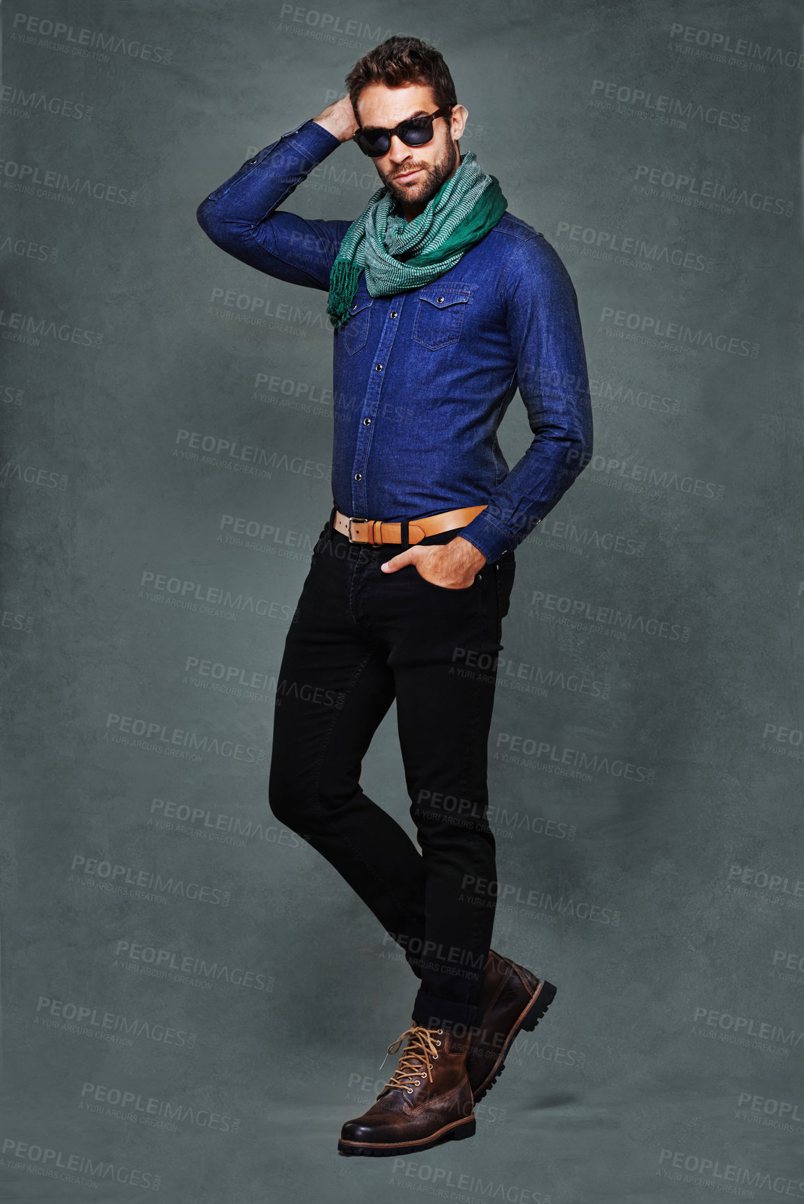 Buy stock photo Fashion, eyewear and studio for male person, stylish and formal clothing isolated on background. Confidence, serious and denim with scarf for man model, pose and casual or trendy contemporary outfit