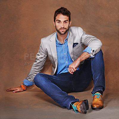 Buy stock photo Style, smile and portrait of man in studio with trendy, stylish and classy suit with confidence. Happy, model and handsome person with elegant fashion for outfit and accessory by brown background.