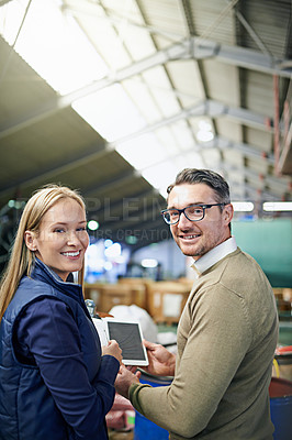 Buy stock photo Factory, logistics and portrait of business people with tablet for manufacturing, ecommerce or distribution. Man, woman and smile with technology for supply chain, inventory or teamwork on inspection