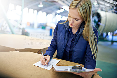 Buy stock photo Business people, writing and checklist with clipboard for delivery, storage or supply chain at warehouse. Female person or employee filling paperwork, documents or application for distribution 