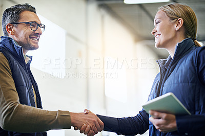 Buy stock photo Handshake, welcome and business people for collaboration, partnership or agreement on deal. Lens flare, tablet and shaking hands for export support, b2b meeting or distribution in shipping factory