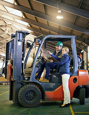 Buy stock photo Talking, warehouse and workers with forklift working on site, loading on dock with Industrial moving vehicle. Teamwork, together or woman with clipboard for shipping inventory, hardhat for safety