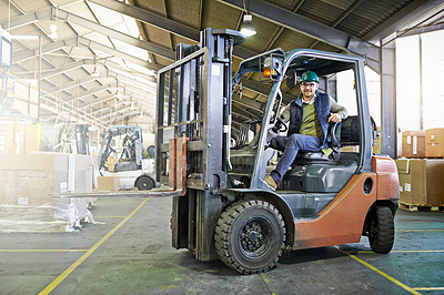 Buy stock photo Portrait of driver in a forklift on the factory floor