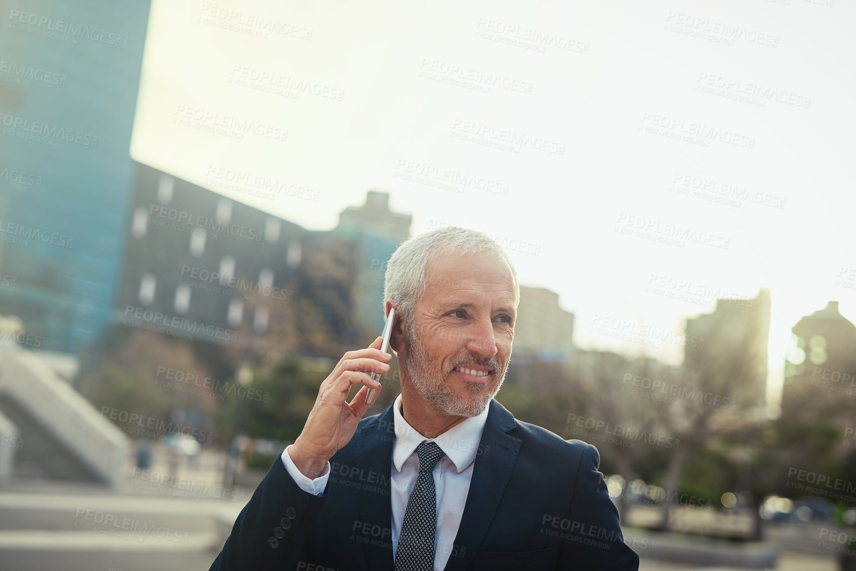 Buy stock photo Businessman, mature and smartphone with phone call in city for business communication or travel, commuting and downtown. Male entrepreneur or lawyer, conversation and talking for corporate b2b.