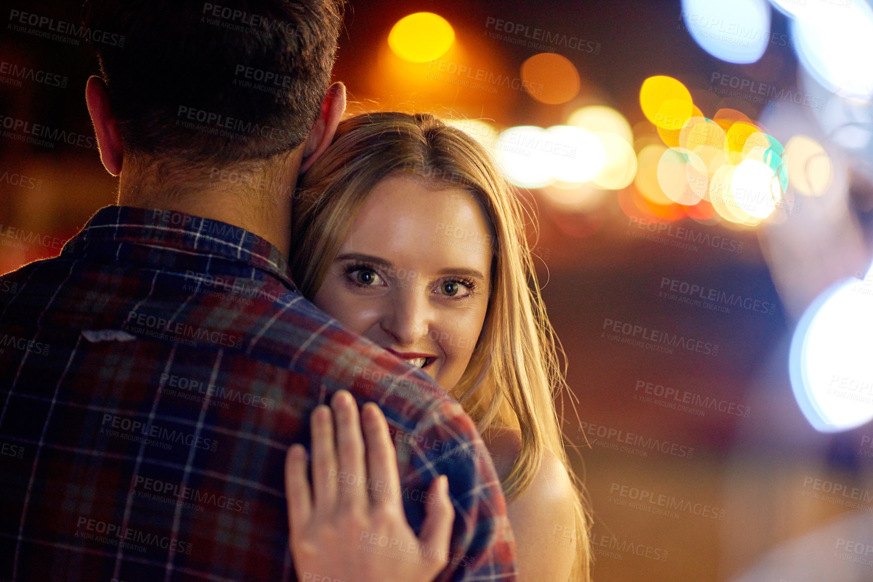 Buy stock photo Shot of a young couple out on a date in the city