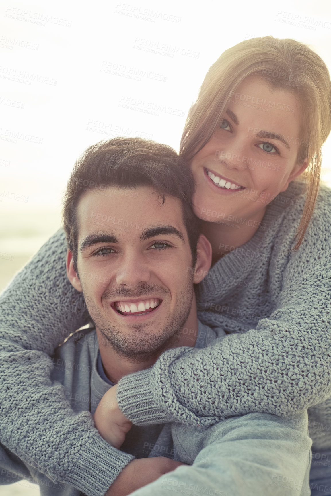 Buy stock photo Happy couple, portrait and outdoor piggyback for playful date, relationship or anniversary. Man, woman and face with smile in Australia for holiday winter with fun bonding, connection or traveling