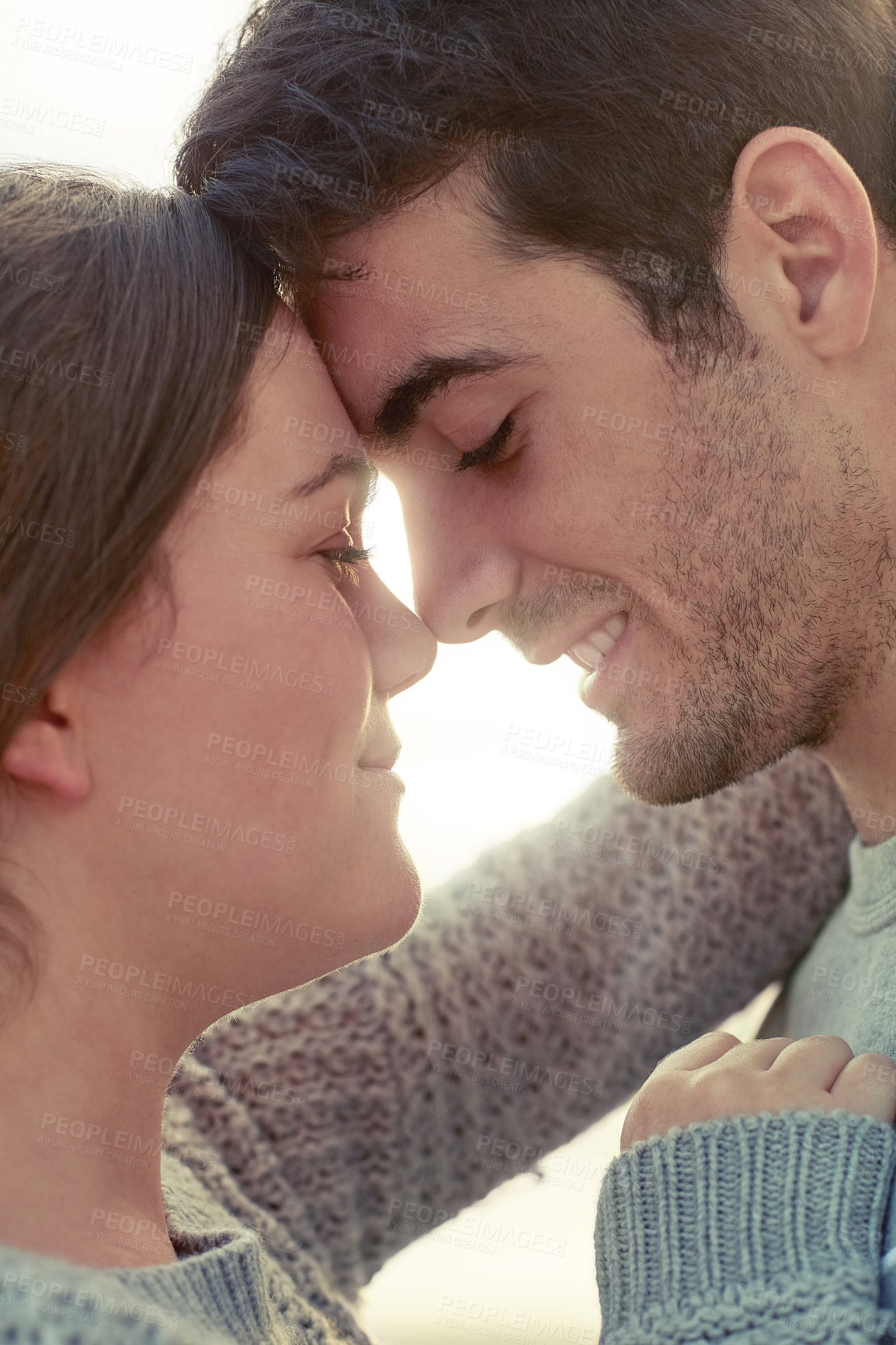 Buy stock photo Couple, forehead touch and outdoor love in nature, romance and bonding for connection or marriage. People, vacation and happy in embrace or support, trust and holiday for affection in relationship