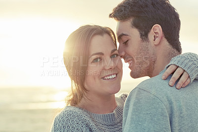 Buy stock photo Portrait of a happy young couple bonding outside