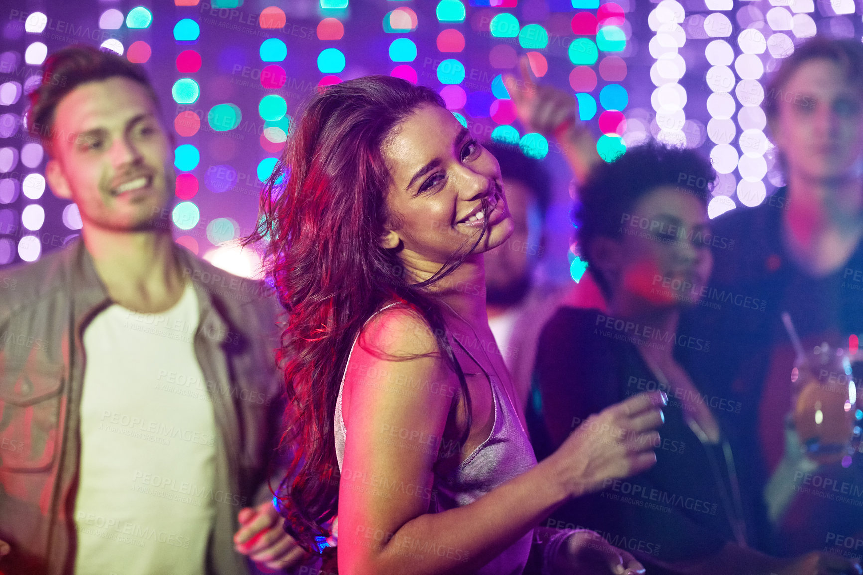 Buy stock photo Portrait, dancing and woman, nightclub and party with friends, smile and celebration for birthday, confidence and fun. Bokeh, group and lights for new year, weekend and countdown in rave with energy