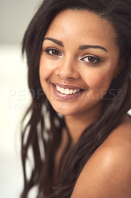 Buy stock photo Portrait of an attractive young woman sitting on her bed