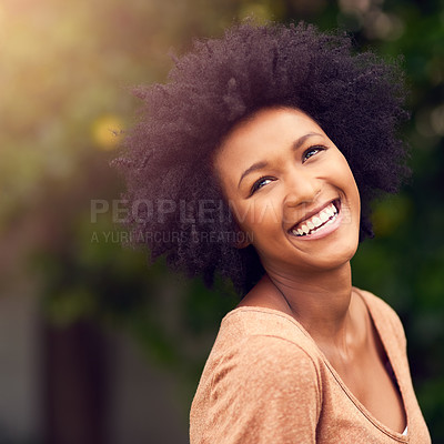 Buy stock photo Shot of a young woman spending the day outdoors