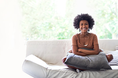 Buy stock photo Shot of a young woman enjoying some time off at home