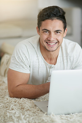 Buy stock photo Man, laptop and student in home portrait, floor and browse for research on college project. Male person, lounge and university website for e learning, education and app for study or online class