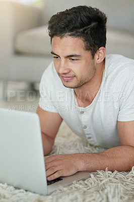 Buy stock photo Man, laptop and student for education in home, floor and browse for research on college project. Male person, lounge and university website for course, assignment and app for study or online class