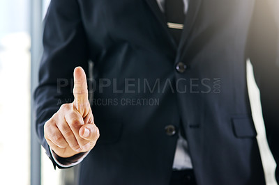 Buy stock photo Cropped shot of a corporate businessman connecting to a user interface with his finger