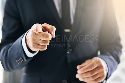 Buy stock photo Cropped shot of a corporate businessman pointing his finger at the camera