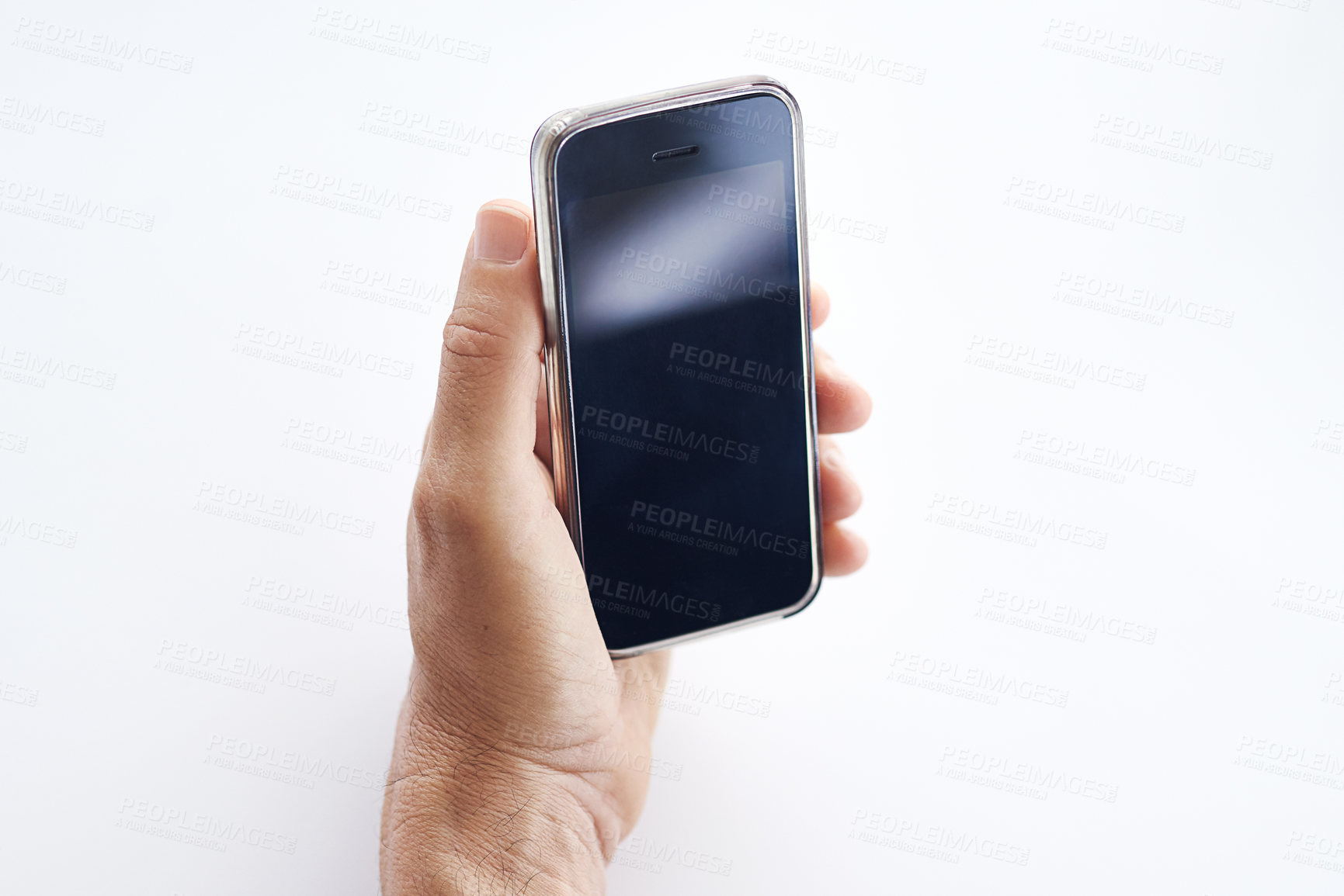 Buy stock photo Closeup shot of a businessman using a cellphone against a white background